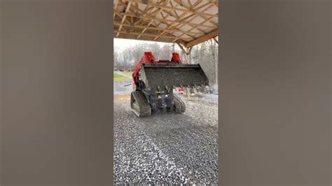 Proper way to Spread Stone with a Skid Loader 